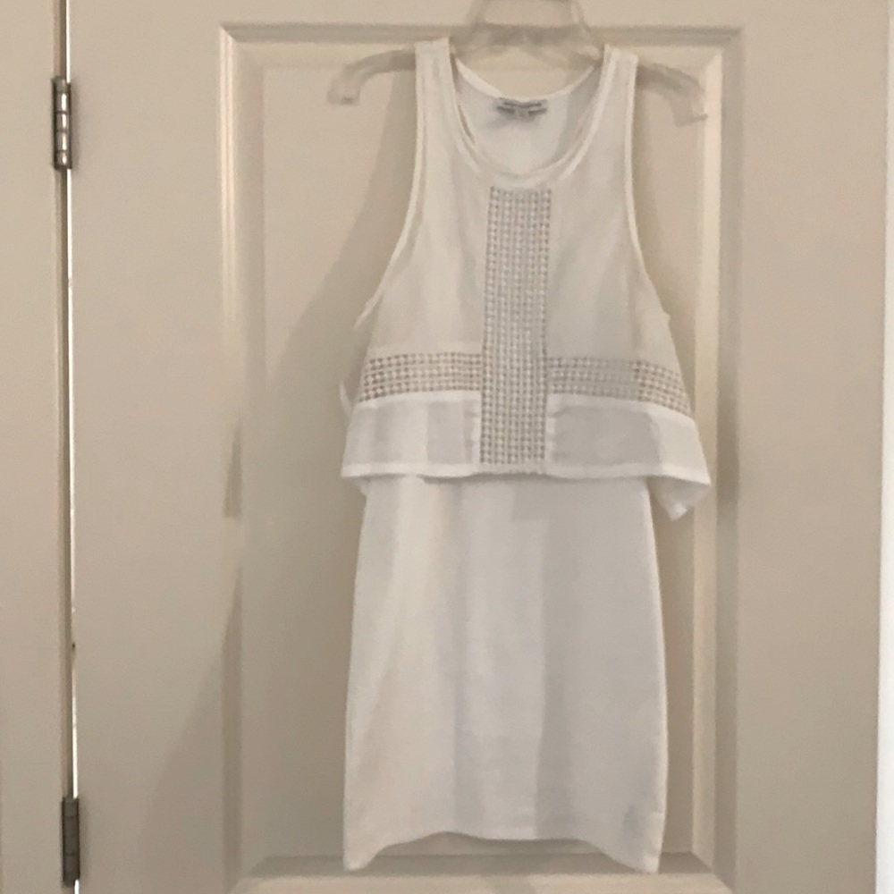 Off white fitted white dress.